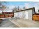 Spacious detached garage with a large driveway and basketball hoop offering ample parking and recreational space at 4509 Eliot St, Denver, CO 80211