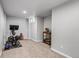 Basement features a workout area and a stylish bar setup, offering space for both fitness and entertainment at 3550 Magnolia St, Denver, CO 80207