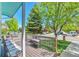 Cozy front porch with seating, offering a relaxing outdoor space with views of the neighborhood at 12333 Newport Ct, Brighton, CO 80602