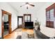 Stylish living room boasts wood floors, and a comfortable gray sofa, creating a cozy atmosphere at 3737 Jason St, Denver, CO 80211
