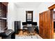 Bright office space with hardwood floors, natural light, and neutral decor, perfect for working from home at 3737 Jason St, Denver, CO 80211