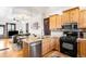 Seamless transition from the kitchen to the living area, perfect for modern living at 3737 Jason St, Denver, CO 80211