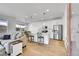 Inviting living area with an island, and stainless steel appliances in the background at 4027 E 98Th Pl, Thornton, CO 80229