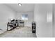 Bright office area featuring modern desks and office chairs, plus stylish decor at 4027 E 98Th Pl, Thornton, CO 80229