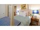 Cozy primary bedroom featuring a four-poster bed and stylish bedside tables at 5377 Cloverbrook Cir, Highlands Ranch, CO 80130
