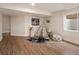 Cozy playroom features wood floors, natural light, and fun decor at 5377 Cloverbrook Cir, Highlands Ranch, CO 80130