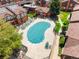 Aerial view of complex with pool and recreation area at 3855 S Monaco St # 166, Denver, CO 80237