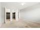 Bright bedroom features neutral colors, carpet, and closet space at 3855 S Monaco St # 166, Denver, CO 80237