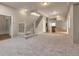 Expansive finished basement with stairs, storage, and ample open space creating a perfect recreational area at 1038 Tenderfoot Dr, Larkspur, CO 80118