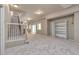 Finished basement with plush carpet, natural light, and ample storage for flexible living and entertainment options at 1038 Tenderfoot Dr, Larkspur, CO 80118
