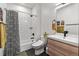 Clean bathroom with a bathtub and a modern vanity at 3116 N Gilpin St, Denver, CO 80205