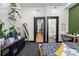 Spacious bedroom with a view of the hallway and en-suite bathroom at 3116 N Gilpin St, Denver, CO 80205