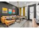 Stylish living room featuring a brown leather sectional and modern decor at 3116 N Gilpin St, Denver, CO 80205