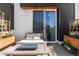 Private patio with seating and fire pit, adjacent to sliding glass doors at 3116 N Gilpin St, Denver, CO 80205