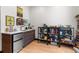 Compact wet bar with mini-fridge and shelving at 3116 N Gilpin St, Denver, CO 80205