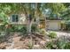 Charming home featuring lush landscaping, a well-maintained lawn, and a welcoming entrance at 1080 Ithaca Dr, Boulder, CO 80305