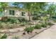 Attractive home featuring a well-manicured lawn and landscaping, with stepping stones to entrance at 1080 Ithaca Dr, Boulder, CO 80305