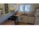 Cozy kitchen features butcher block counters, stainless steel appliances and bright window at 1080 Ithaca Dr, Boulder, CO 80305