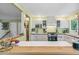 Bright kitchen featuring white cabinets, modern appliances, and an open layout at 1080 Ithaca Dr, Boulder, CO 80305
