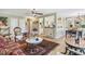 Spacious living room with open floor plan, elegant furniture, and seamless flow to dining at 1080 Ithaca Dr, Boulder, CO 80305
