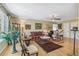 Inviting living room with hardwood floors, comfortable seating, and natural light at 1080 Ithaca Dr, Boulder, CO 80305