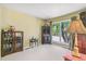 Cozy living room with neutral carpet, large windows, and classic wooden furniture at 1080 Ithaca Dr, Boulder, CO 80305