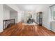 Bright dining room features hardwood floors, and large windows at 9960 Garland Ln, Broomfield, CO 80021