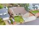 Beautiful two-story home with manicured lawn, stone accents, an attached two-car garage and a charming entrance at 9960 Garland Ln, Broomfield, CO 80021