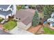 A beautifully-landscaped home with a two-car garage and stone accents at 9960 Garland Ln, Broomfield, CO 80021