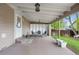 Covered outdoor patio with built-in shelving, perfect for relaxing or entertaining guests at 9960 Garland Ln, Broomfield, CO 80021