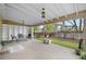 Inviting covered patio offering a peaceful outdoor space with a built-in shelving unit at 9960 Garland Ln, Broomfield, CO 80021