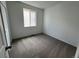 Neutral bedroom with carpet and natural light from the window at 6601 N Netherland St, Aurora, CO 80019