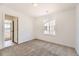 Cozy bedroom with carpet flooring, one window, and a standard closet at 907 Congress Pl, Elizabeth, CO 80107