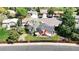 Aerial view showcases a home's landscaped yard, backyard patio with shade, and neighborhood at 10950 Tennyson Ct, Westminster, CO 80031