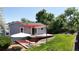 Backyard patio features a shade sail, providing a relaxing outdoor living space at 10950 Tennyson Ct, Westminster, CO 80031