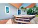 Backyard deck showcasing access to the home's interior and a view of the surrounding landscape at 10950 Tennyson Ct, Westminster, CO 80031