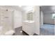 Modern bathroom featuring a walk-in shower, contemporary vanity, and clean design, ensuring a refreshing experience at 10950 Tennyson Ct, Westminster, CO 80031
