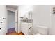Neat bathroom showcasing modern fixtures, including a stylish vanity, toilet, and unique mosaic tile accents at 10950 Tennyson Ct, Westminster, CO 80031