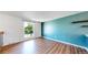 Bright bedroom with large window offering natural light and views of the outdoors at 10950 Tennyson Ct, Westminster, CO 80031