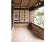 Inviting front porch with brick features and wood lattice, perfect for relaxing at 401 S Williams St, Denver, CO 80209