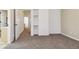 Spacious bedroom with neutral carpeting and ample closet space at 4452 S Auckland Ct, Aurora, CO 80015