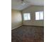 Bright bedroom featuring vaulted ceilings and carpet at 4452 S Auckland Ct, Aurora, CO 80015