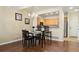 Dining area with table and chairs, kitchen access at 4452 S Auckland Ct, Aurora, CO 80015