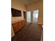 Upstairs hallway with access to bedrooms and built-in storage at 4452 S Auckland Ct, Aurora, CO 80015