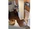 View of kitchen and stairs with dark hardwood floors at 4452 S Auckland Ct, Aurora, CO 80015