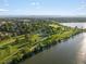 Picturesque aerial view of the waterfront community and recreational park, a beautiful setting at 1612 Wolff St, Denver, CO 80204