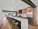 A gourmet kitchen with modern appliances, island seating, and stylish finishes at 1612 Wolff St, Denver, CO 80204