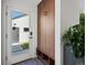 Convenient mud room with built-in storage and geometric tile flooring, adjacent to an exterior door at 1612 Wolff St, Denver, CO 80204