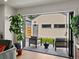 Outdoor patio with chairs surrounded by an exterior view at 1612 Wolff St, Denver, CO 80204