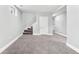 Finished basement with stairs and ample space at 9300 Grove St, Westminster, CO 80031